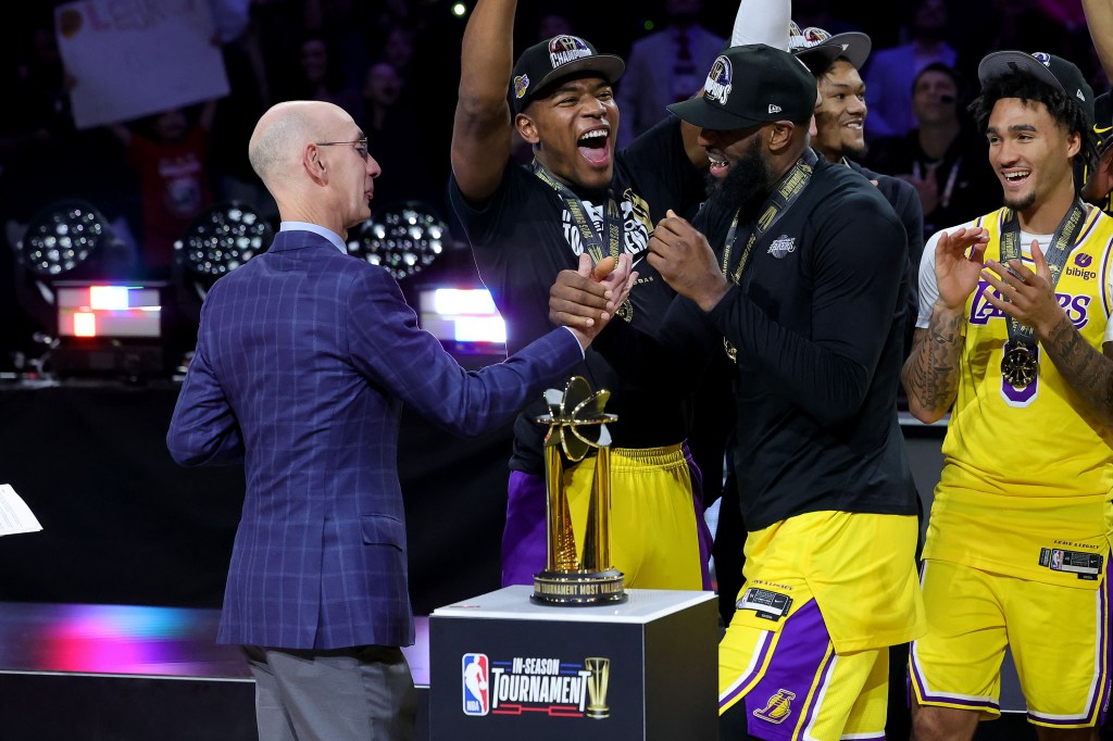 NBA commissioner Adam Silver congratulates LeBron James and the Lakers after they won the NBA In-Season Tournament.