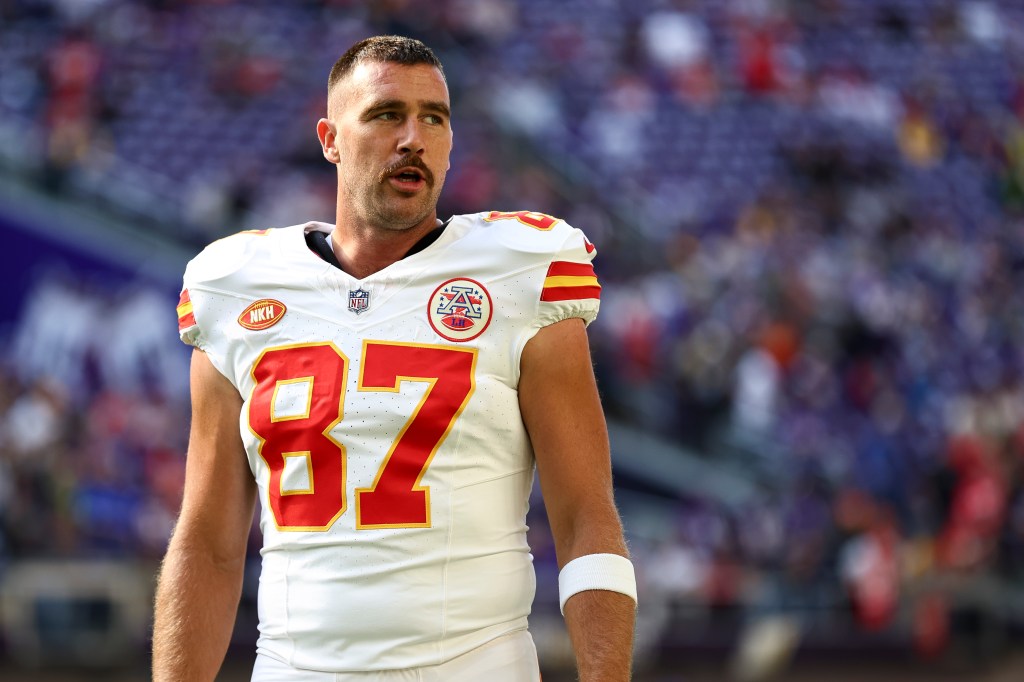 Travis Kelce #87 of the Kansas City Chiefs warms up prior to an NFL football game against the Minnesota Vikings at U.S. Bank Stadium on October 8, 2023 in Minneapolis, Minnesota.